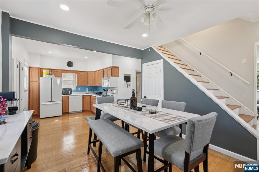 471 Harding Avenue Lyndhurst, NJ 07071 - Photo 24 of 50 a dining room with furniture and wooden floor