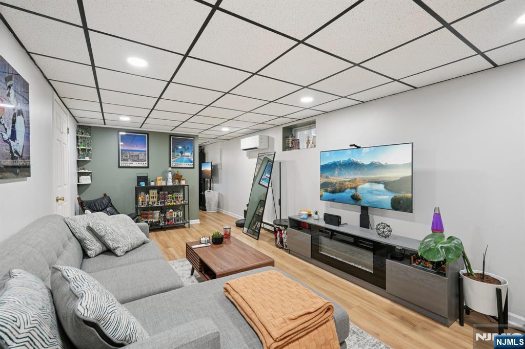 471 Harding Avenue Lyndhurst, NJ 07071 - Photo 30 of 50 a living room with furniture and a chandelier