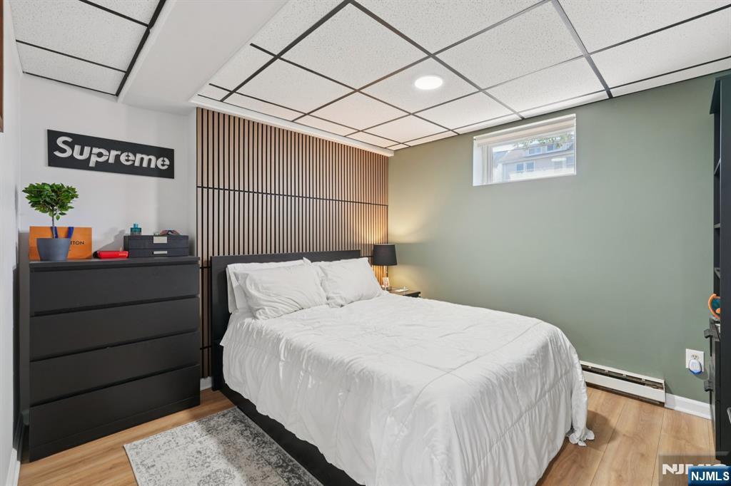 471 Harding Avenue Lyndhurst, NJ 07071 - Photo 33 of 50 a bedroom with a bed and a window