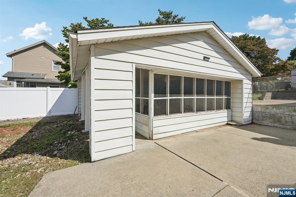 471 Harding Avenue Lyndhurst, NJ 07071 - Photo 4 of 50 a view of a house with a large space in front of it