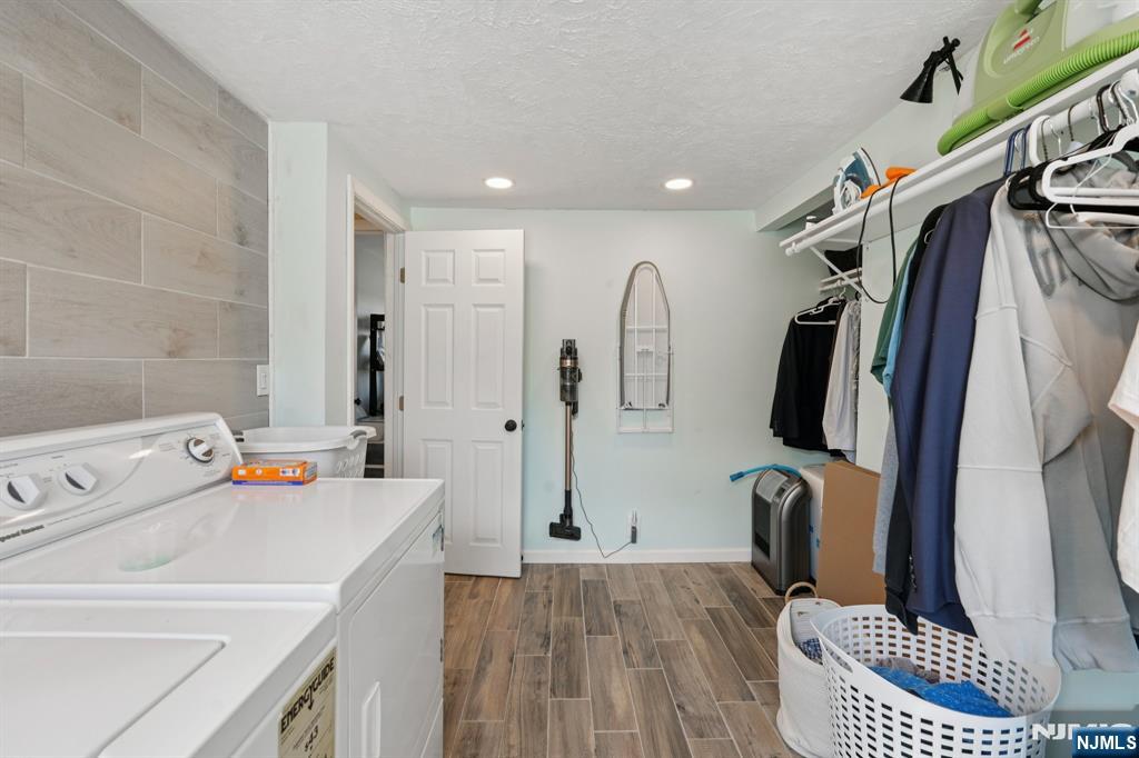 471 Harding Avenue Lyndhurst, NJ 07071 - Photo 43 of 50 a view of walk in closet with clothes and shoes