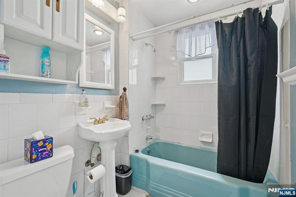471 Harding Avenue Lyndhurst, NJ 07071 - Photo 44 of 50 a bathroom with a sink toilet and shower
