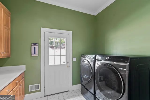 a bathroom with a granite countertop sink mirror vanity and toilet