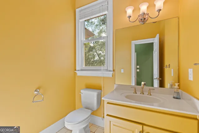 a view of kitchen with cabinets and wooden floor