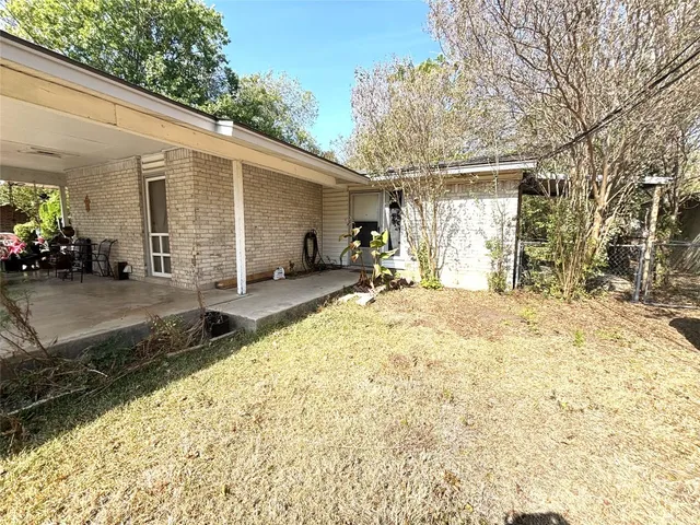 a view of a house with a patio