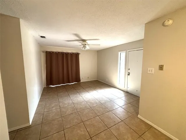 a view of a livingroom with a bathroom