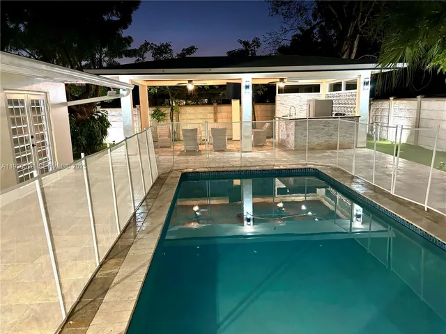 a view of an empty room with a garage