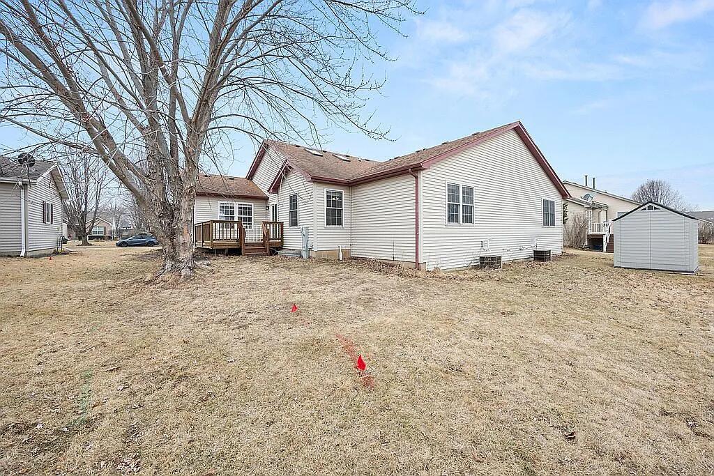 678 Elizabeth Street Maple Park, IL 60151 - Photo 1 of 18 a white house that has a tree in front of it