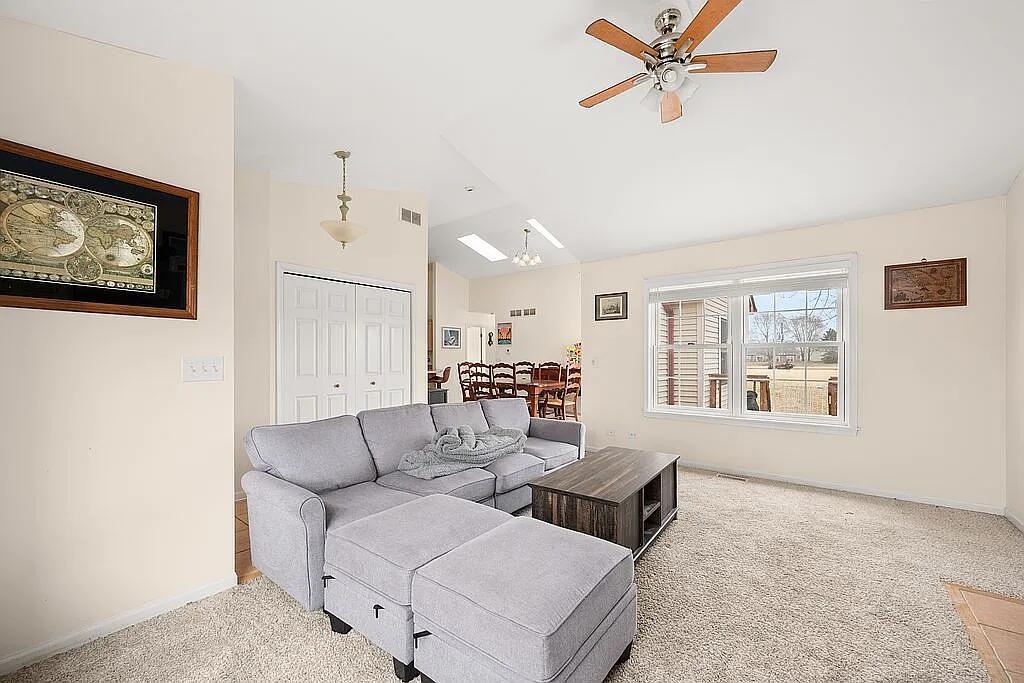 678 Elizabeth Street Maple Park, IL 60151 - Photo 4 of 18 a living room with furniture and a window