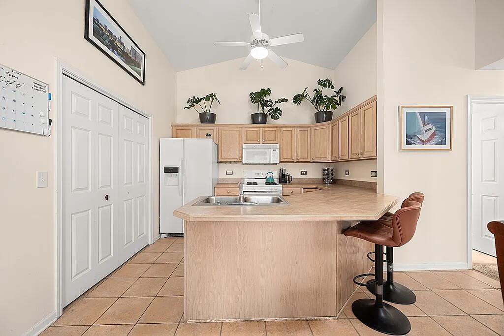 678 Elizabeth Street Maple Park, IL 60151 - Photo 5 of 18 a view of living room with furniture and a chandelier
