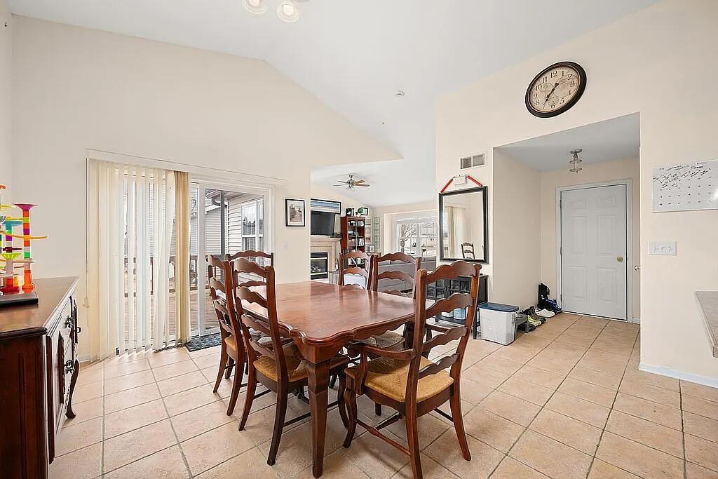 678 Elizabeth Street Maple Park, IL 60151 - Photo 8 of 18 a dining room with furniture and window