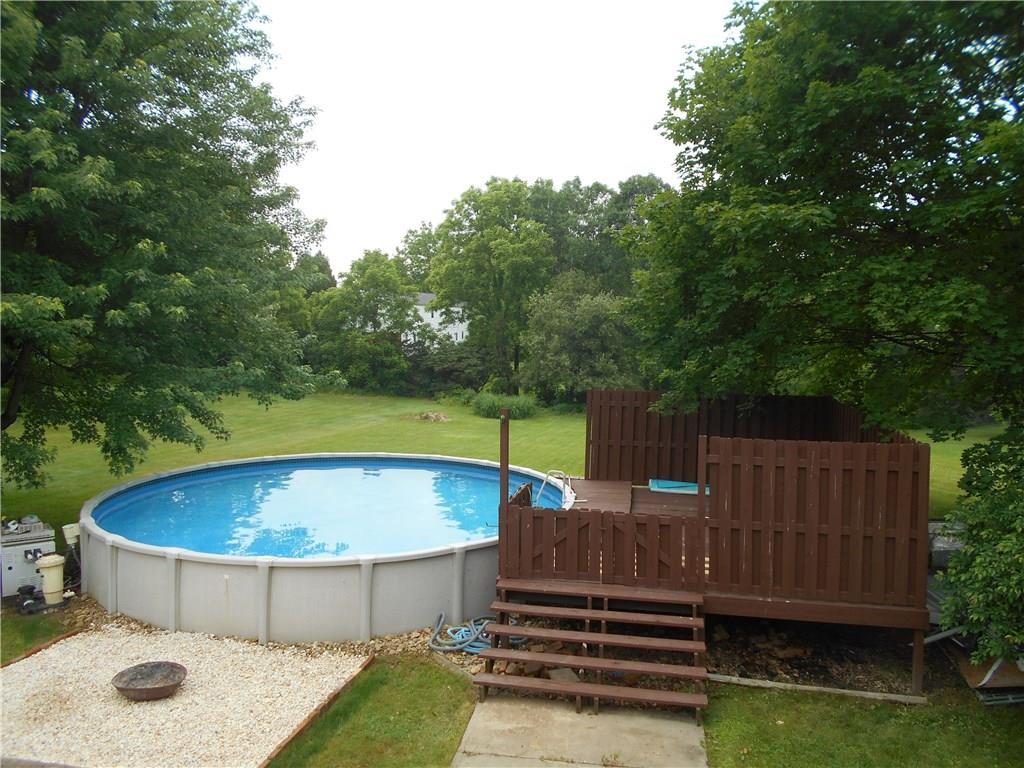 133 Singleton Road Sarver, PA 16055 - Photo 16 of 20 Refreshing swimming pool with privacy deck.