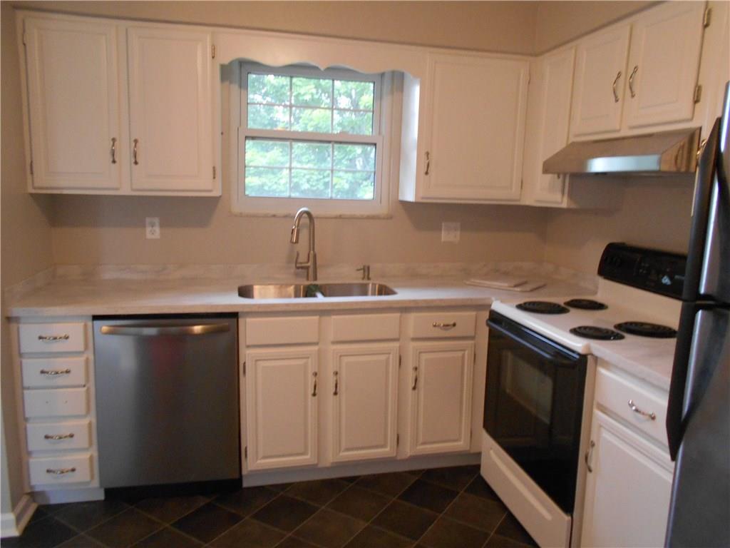 133 Singleton Road Sarver, PA 16055 - Photo 3 of 20 Brand new dishwasher included. Double sink looks out to back yard.