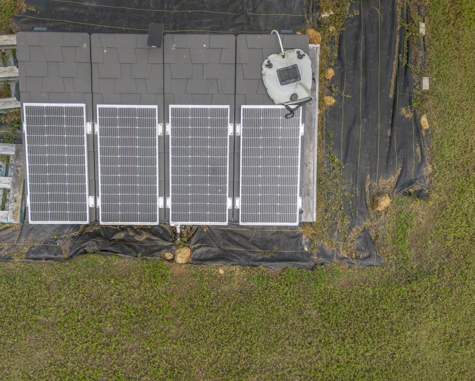 320 Hanauana Road Haiku, HI 96708 - Photo 11 of 33 a bathroom with a granite countertop shower and a sink