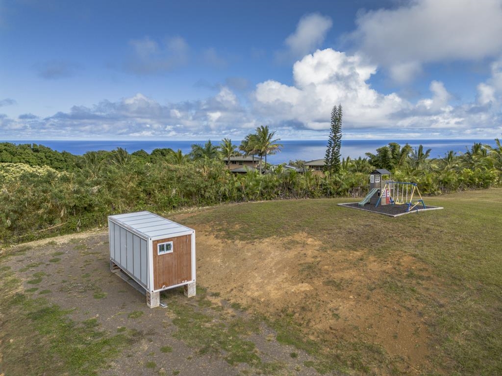 320 Hanauana Road Haiku, HI 96708 - Photo 13 of 33 a front view of a house with a yard