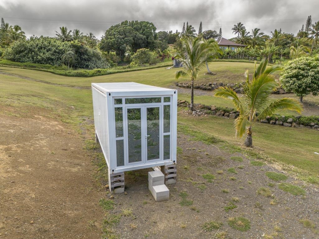 320 Hanauana Road Haiku, HI 96708 - Photo 14 of 33 an aerial view of a house with a yard