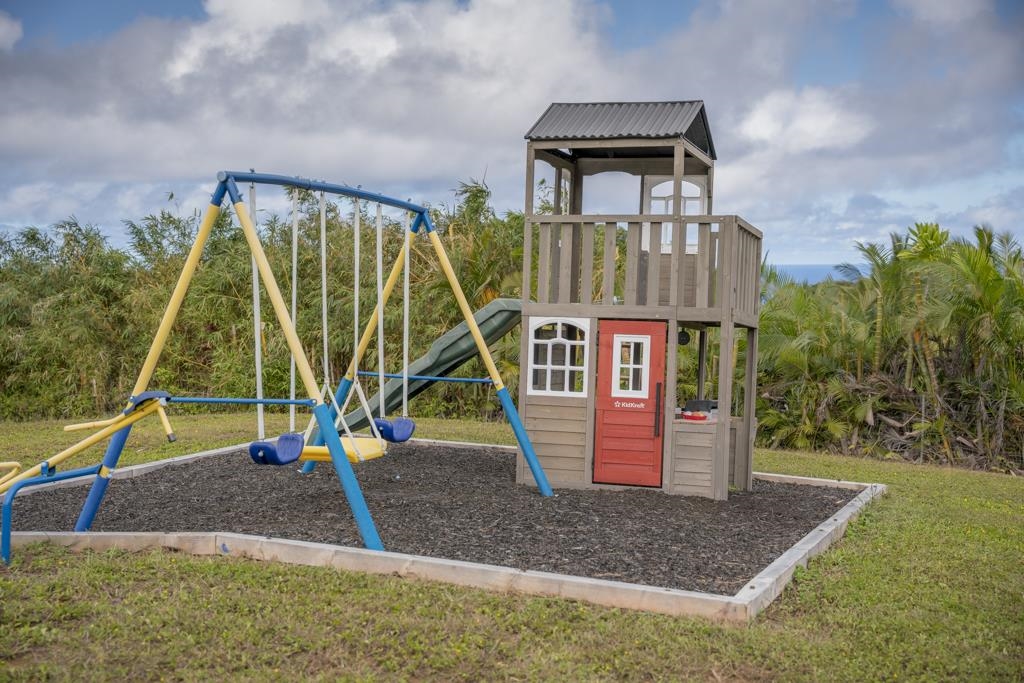 320 Hanauana Road Haiku, HI 96708 - Photo 17 of 33 a childrens park with lots of swings and slides