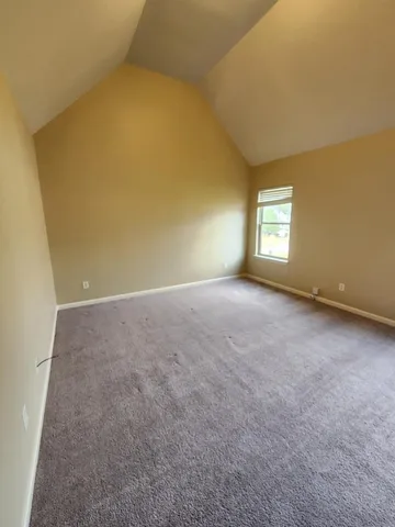 a room with a sink and a mirror