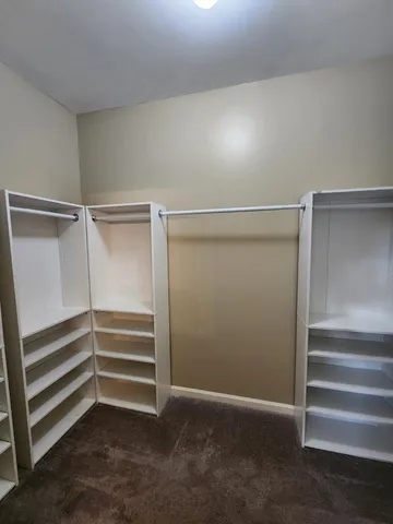 a view of room with cabinets