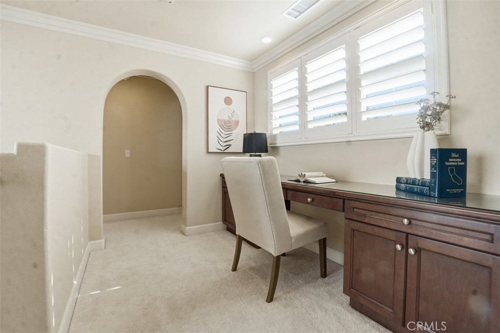 65 Rolling Green Irvine, CA 92620 - Photo 22 of 49 a living room with furniture and windows