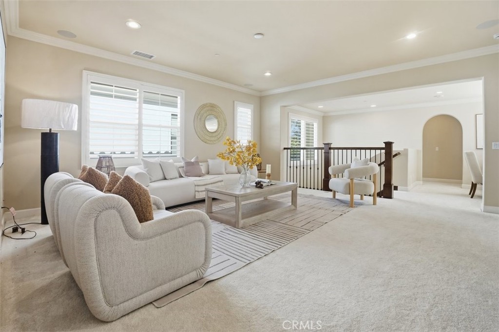 65 Rolling Green Irvine, CA 92620 - Photo 24 of 49 a living room with furniture and a large window
