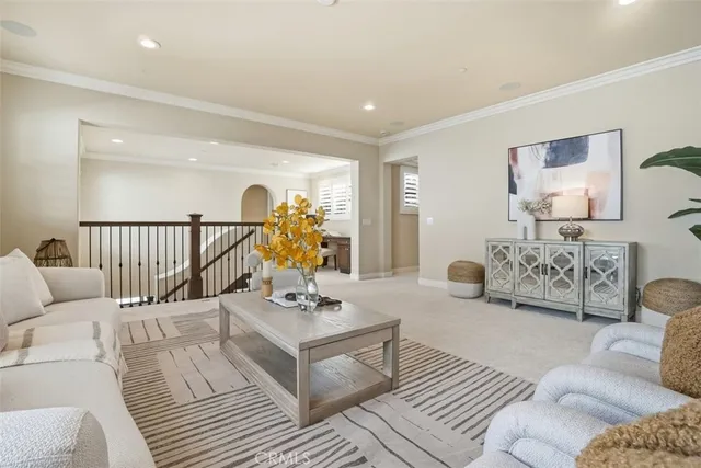 a living room with furniture and a table