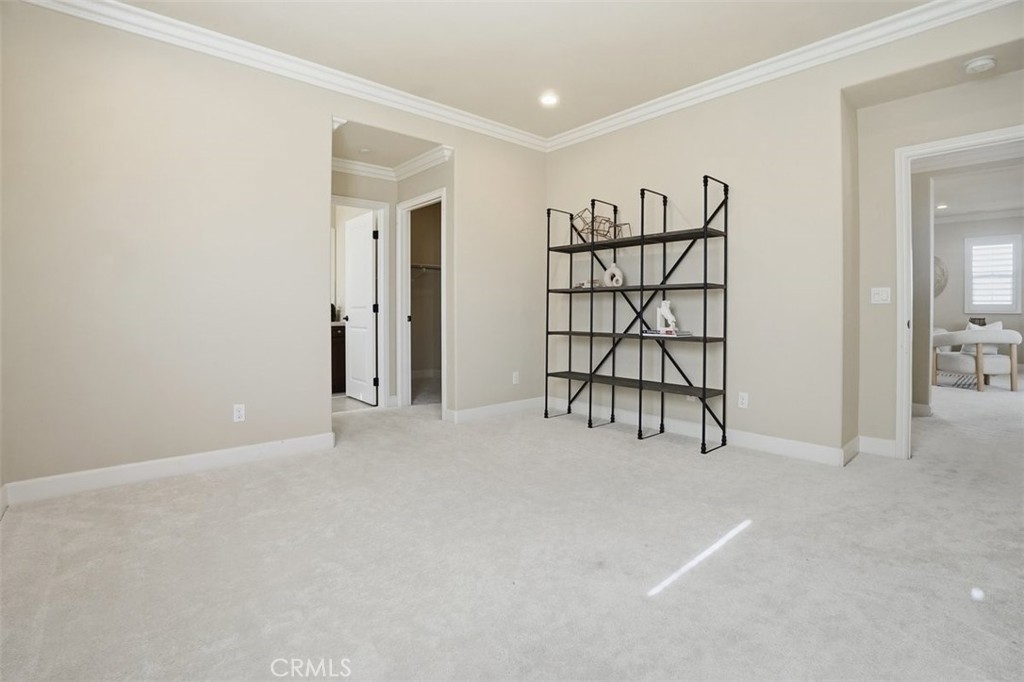 65 Rolling Green Irvine, CA 92620 - Photo 34 of 49 an empty room with windows and closet