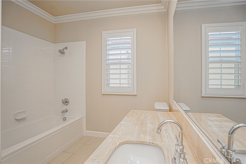 65 Rolling Green Irvine, CA 92620 - Photo 36 of 49 a spacious bathroom with a bathtub and shower