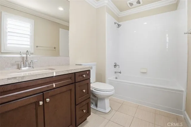 a bathroom with a sink a toilet and a bathtub
