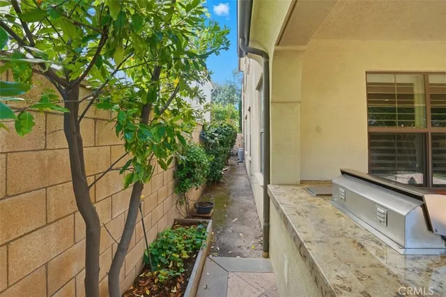 a hallway with plants