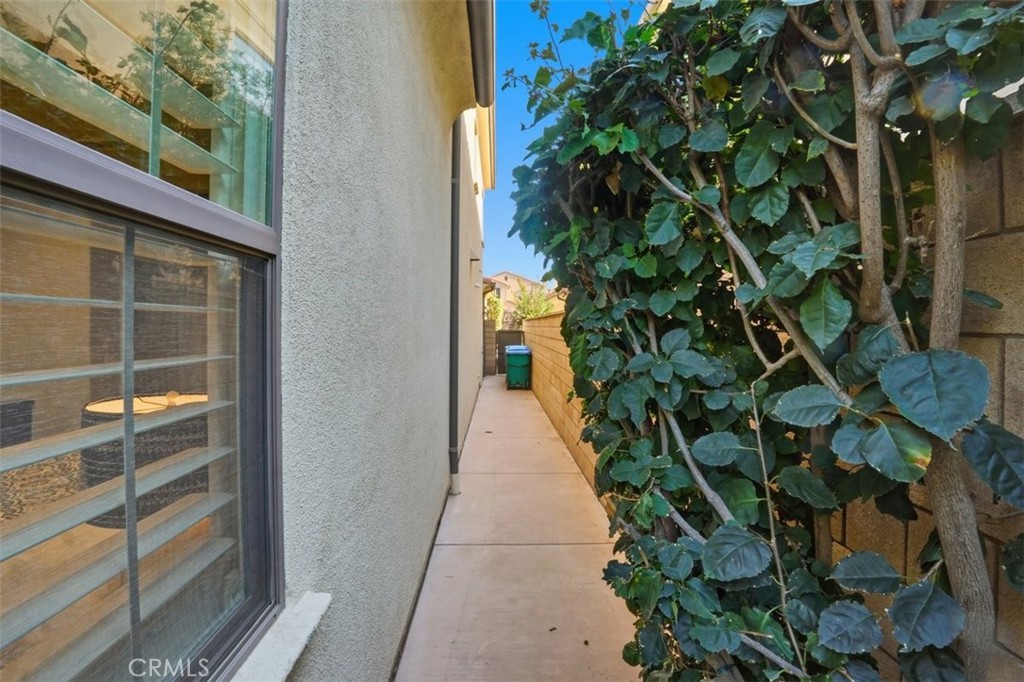 65 Rolling Green Irvine, CA 92620 - Photo 46 of 49 a hallway with plants