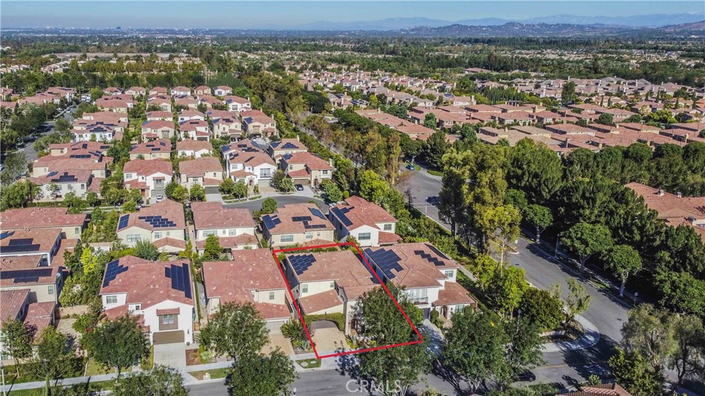 65 Rolling Green Irvine, CA 92620 - Photo 47 of 49 an aerial view of residential houses with outdoor space