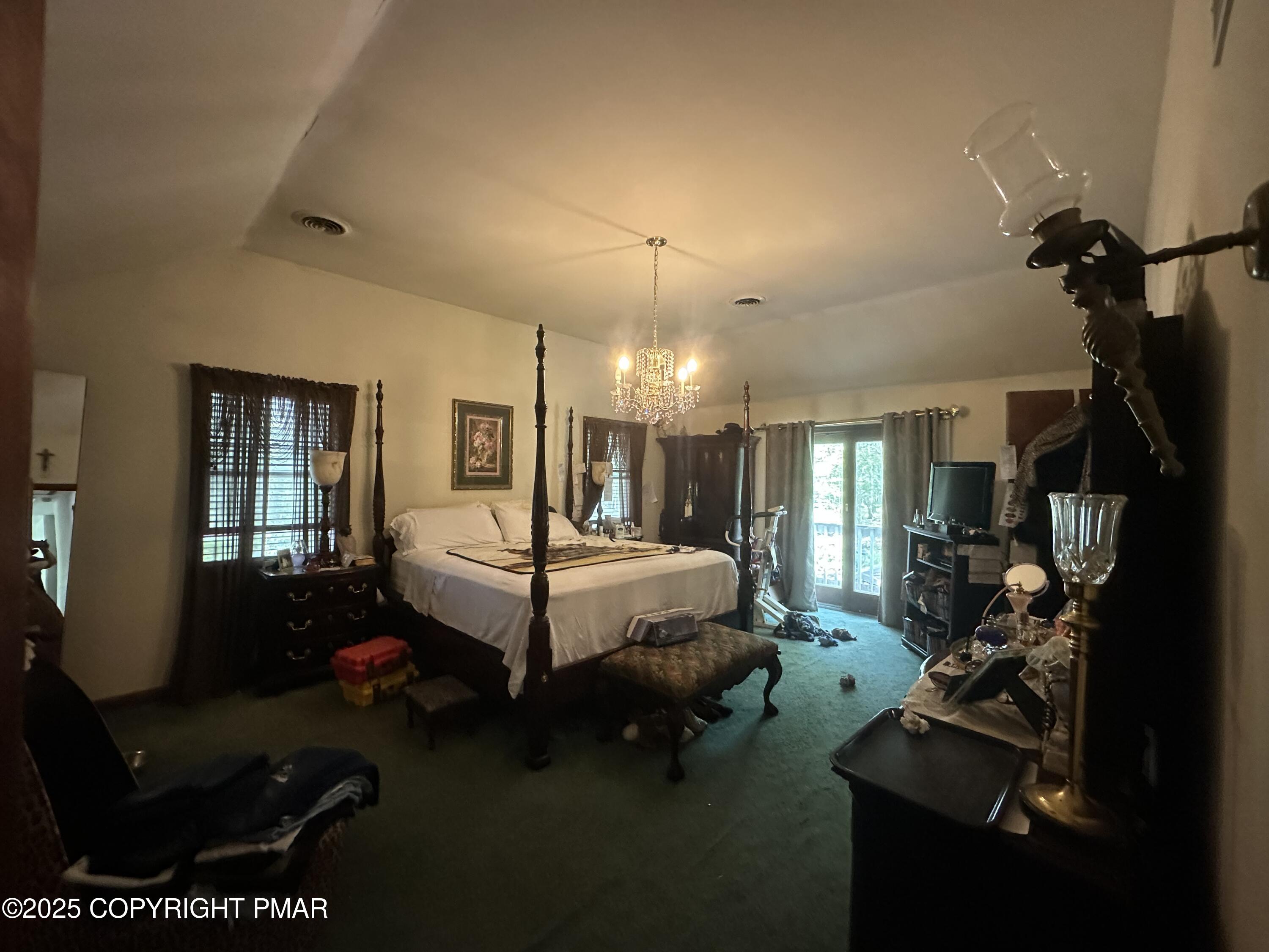 2162 Longview Drive Bushkill, PA 18324 - Photo 20 of 33 a spacious bedroom with a bed a couch and dresser