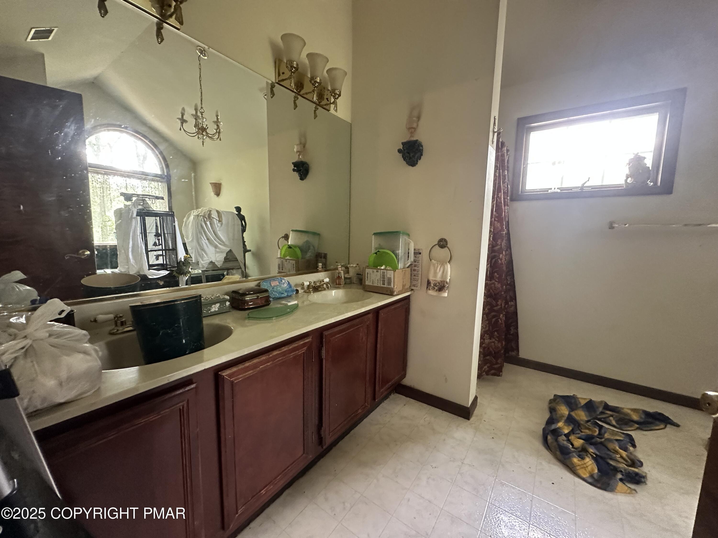 2162 Longview Drive Bushkill, PA 18324 - Photo 22 of 33 a bathroom with a sink double vanity and a mirror