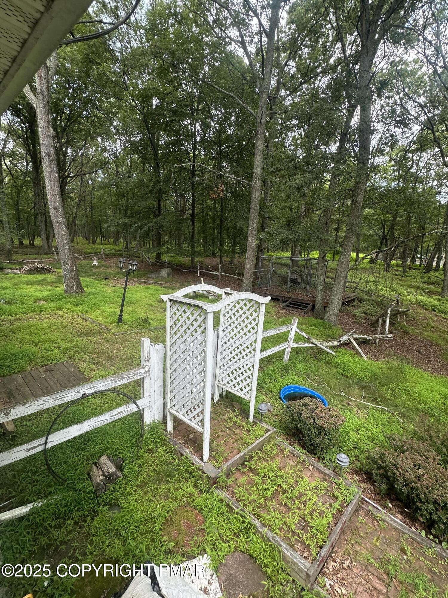 2162 Longview Drive Bushkill, PA 18324 - Photo 33 of 33 a view of a garden with a bench
