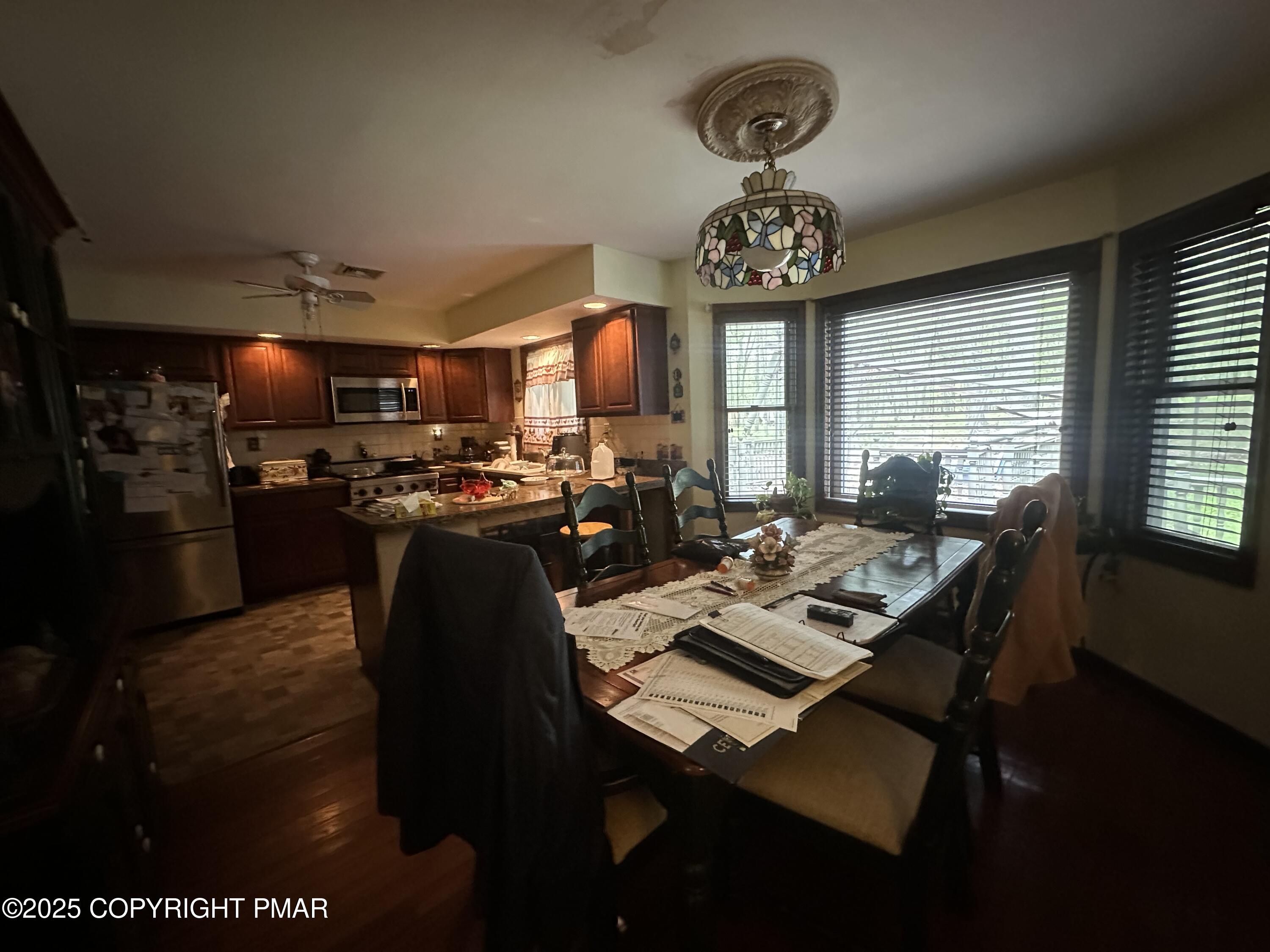 2162 Longview Drive Bushkill, PA 18324 - Photo 9 of 33 a view of a dining room with furniture window and outside view