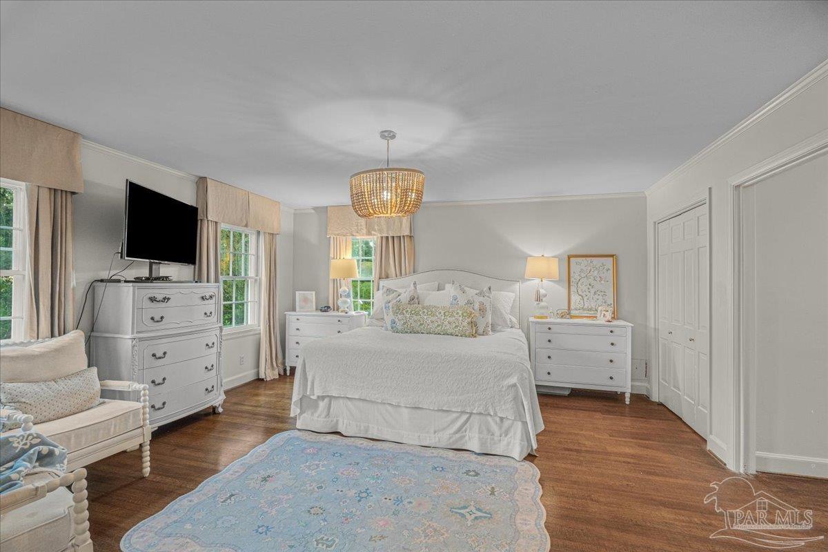 3361 Palermo Road Pensacola, FL 32503 - Photo 39 of 50 a bedroom with furniture and flat screen tv