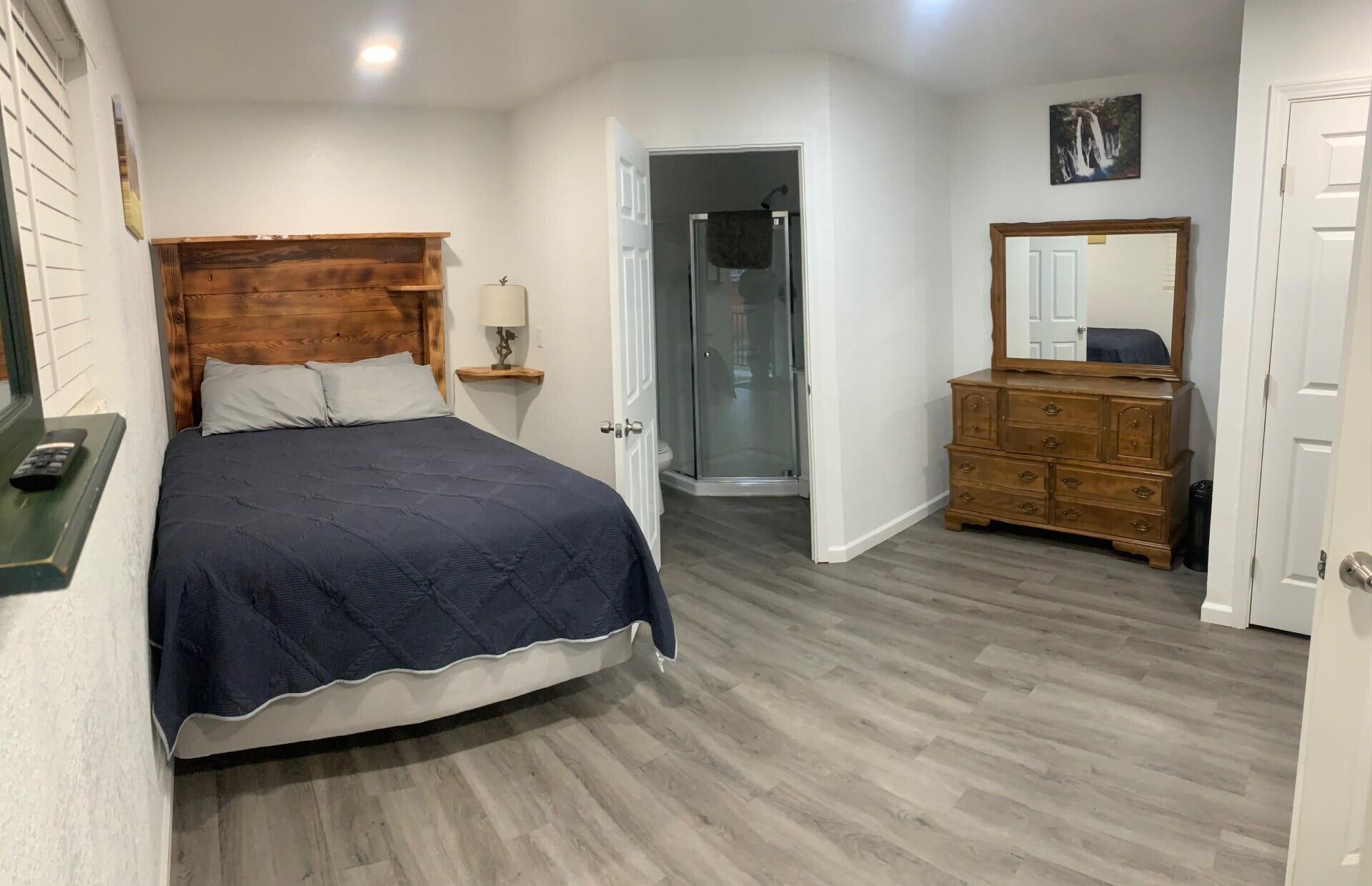 38082 State Highway Burney, CA 96013 - Photo 12 of 21 a bedroom with a bed and a view of bathroom