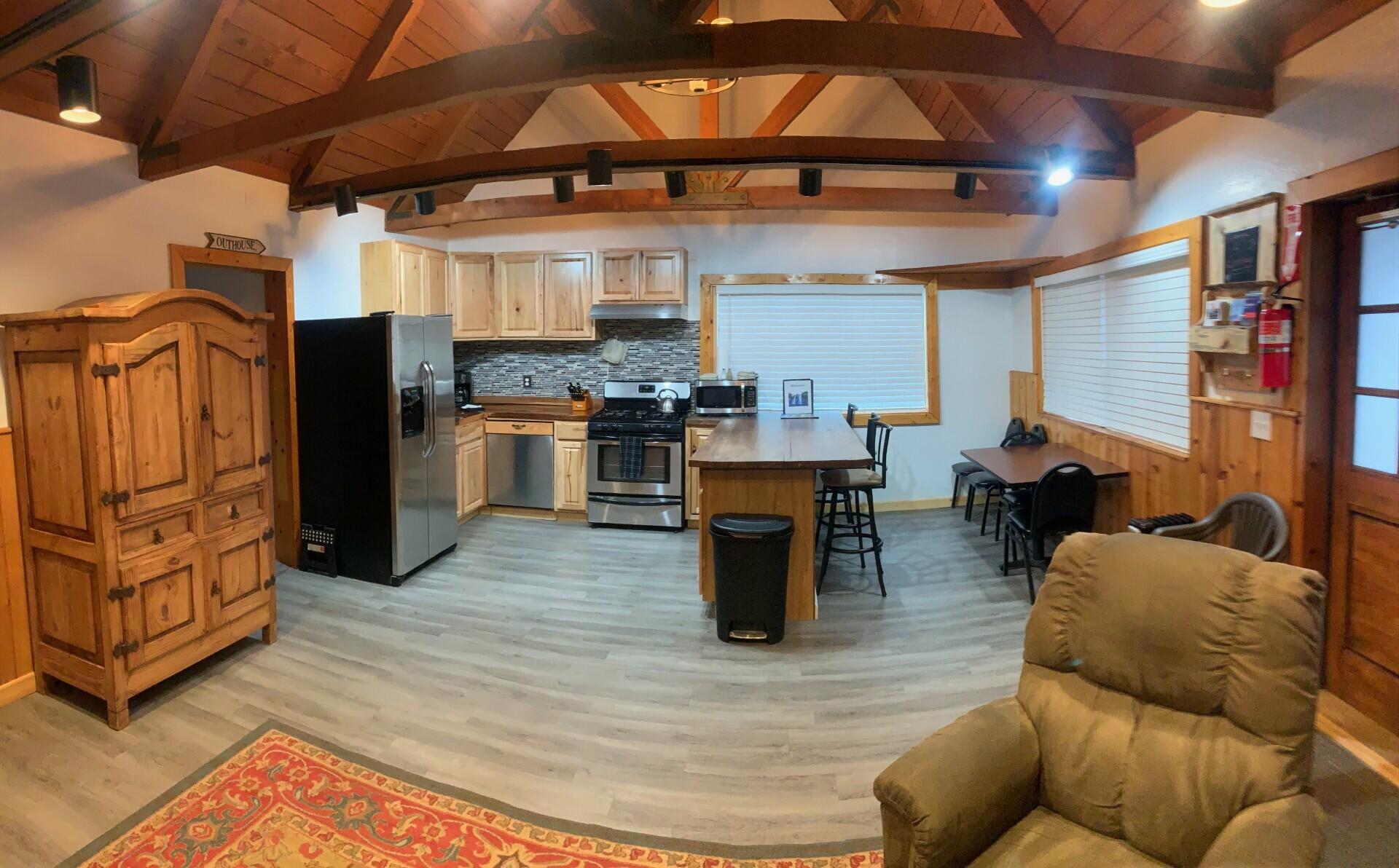 38082 State Highway Burney, CA 96013 - Photo 4 of 21 a living room with lots of furniture and kitchen view