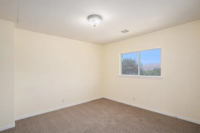 an empty room with a workbench