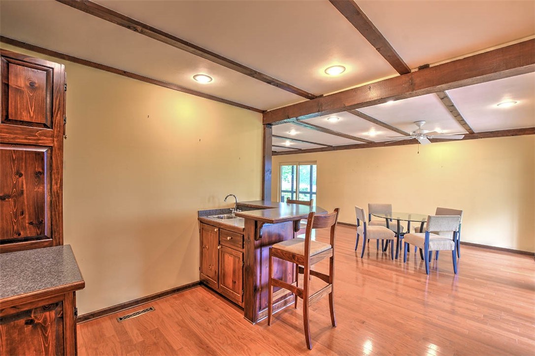 877 East 1800 North Road Assumption, IL 62510 - Photo 18 of 46 a view of a dining room with furniture window and wooden floor
