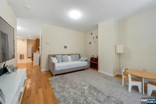 a living room with furniture and a couch