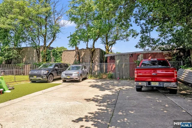 a car parked in front of a house