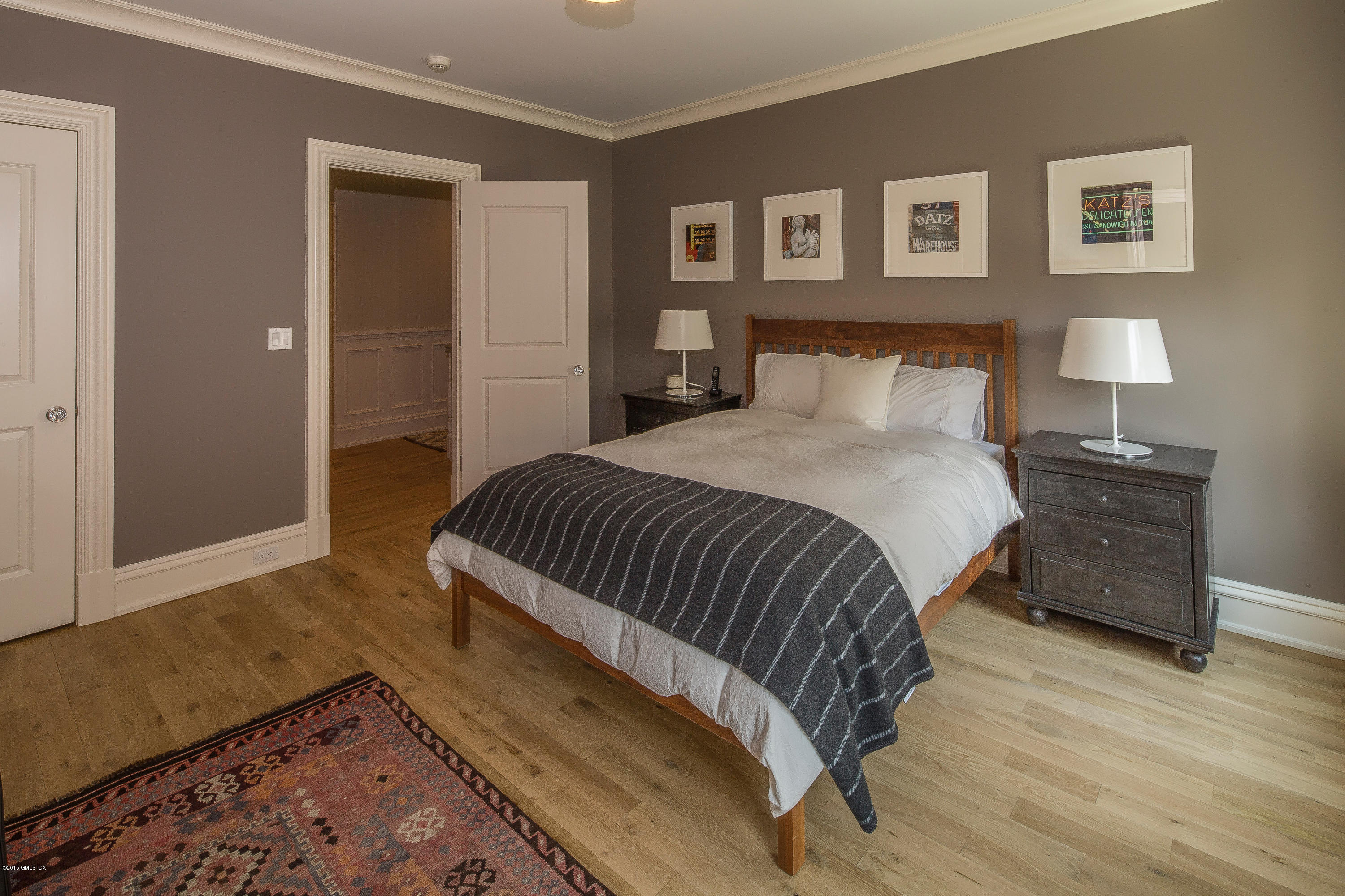 264 Riverside Avenue Riverside, CT 06878 - Photo 17 of 27 a bedroom with a bed and a night stand