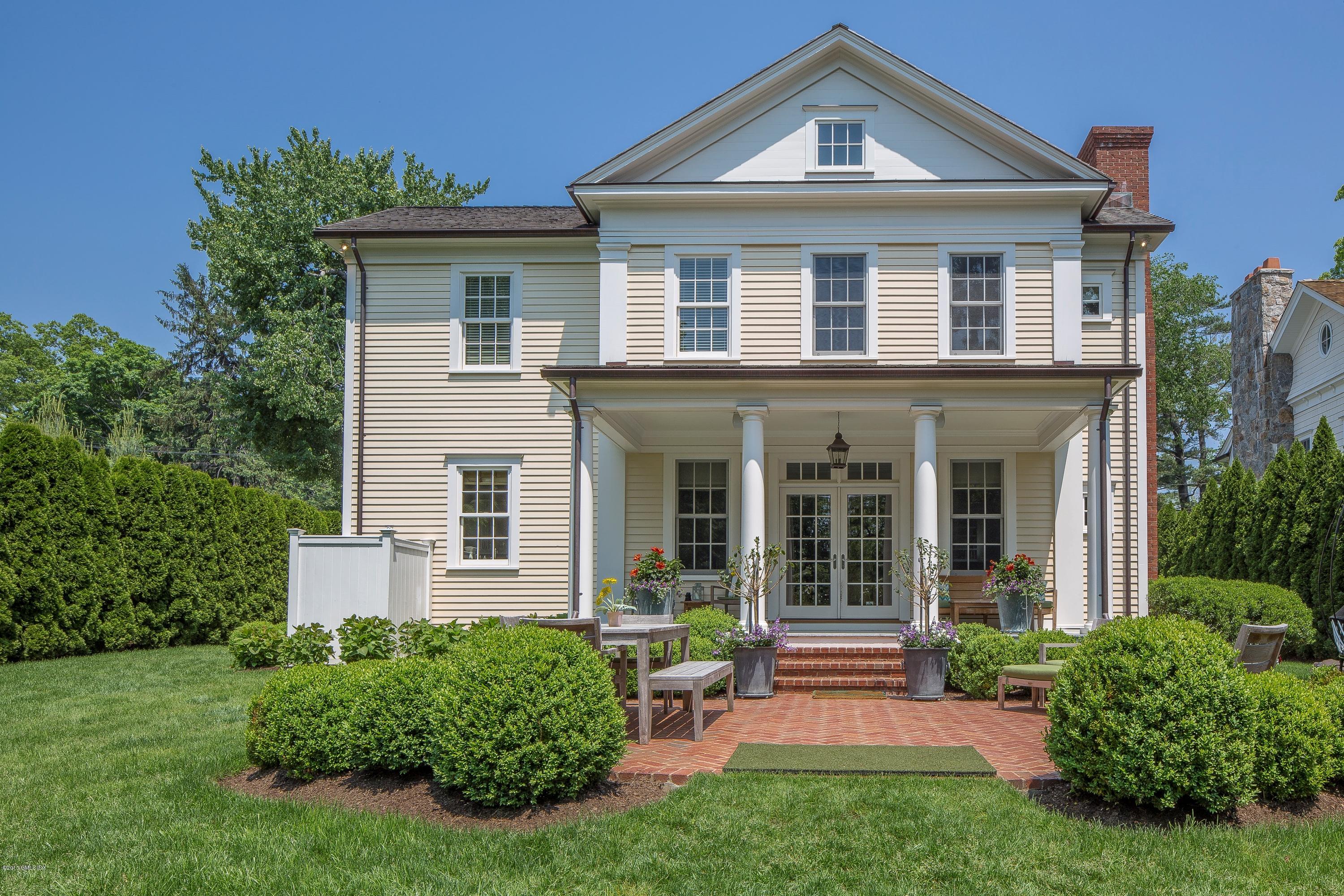 264 Riverside Avenue Riverside, CT 06878 - Photo 24 of 27 front view of a house with a yard