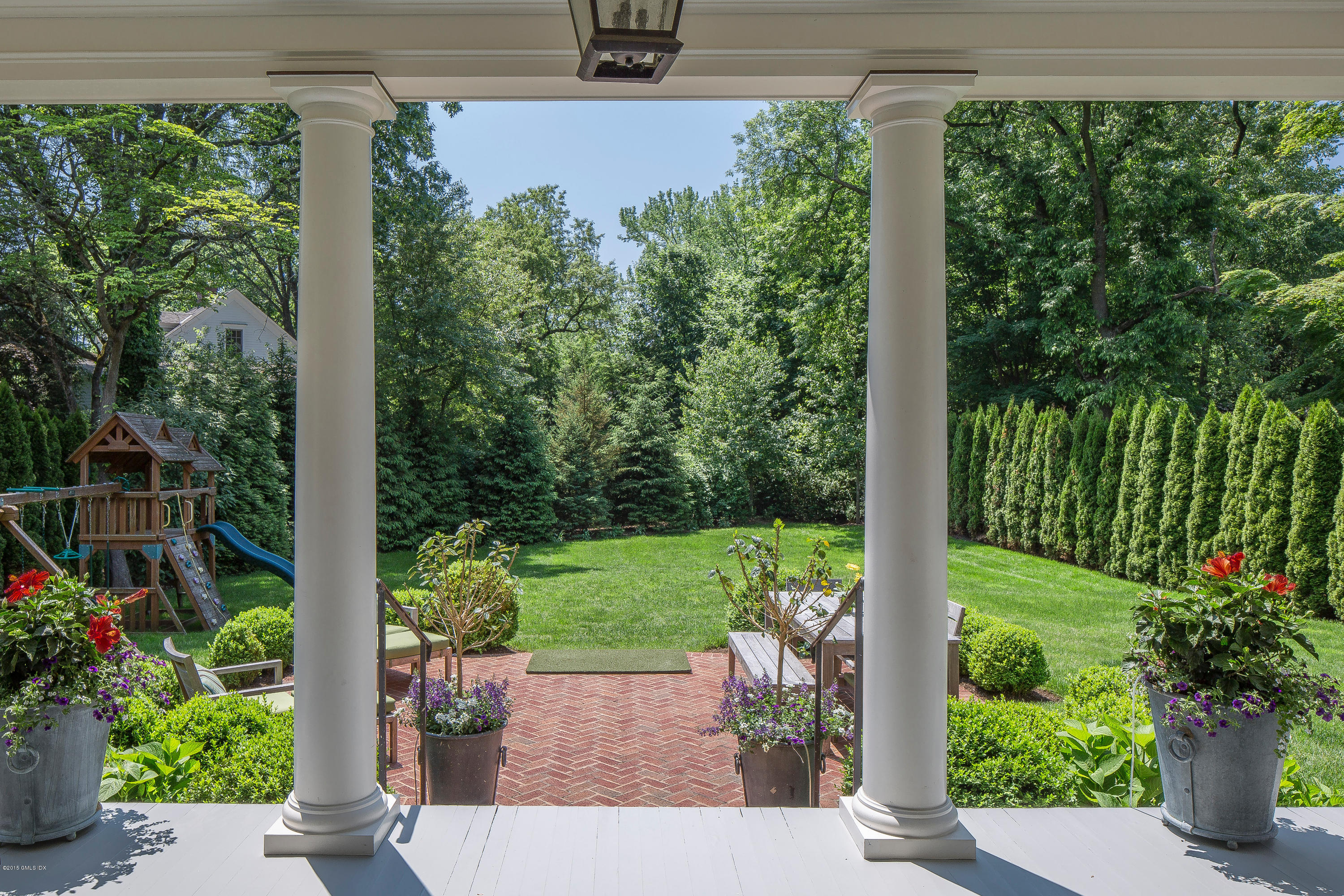 264 Riverside Avenue Riverside, CT 06878 - Photo 25 of 27 a view of a garden from a window