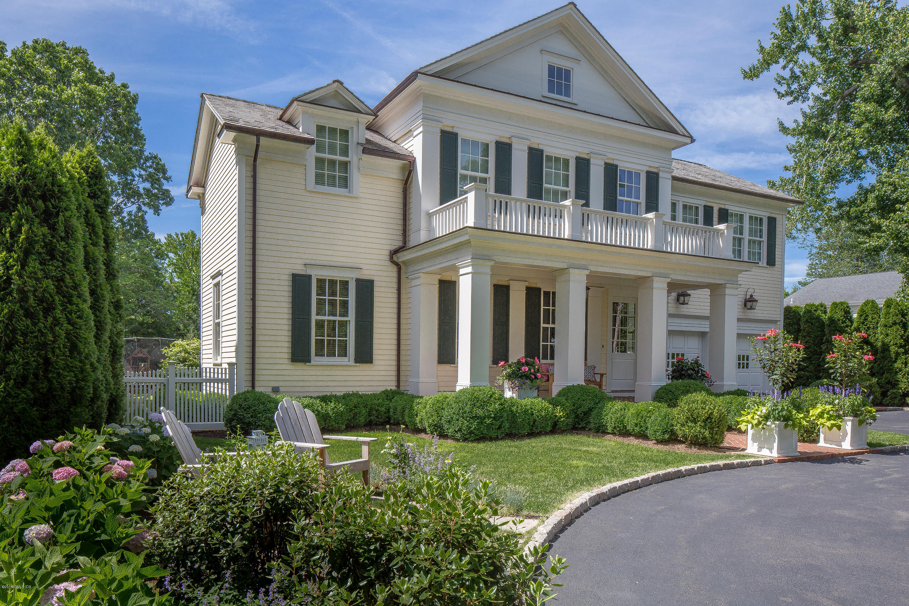 264 Riverside Avenue Riverside, CT 06878 - Photo 27 of 27 front view of a house with a yard