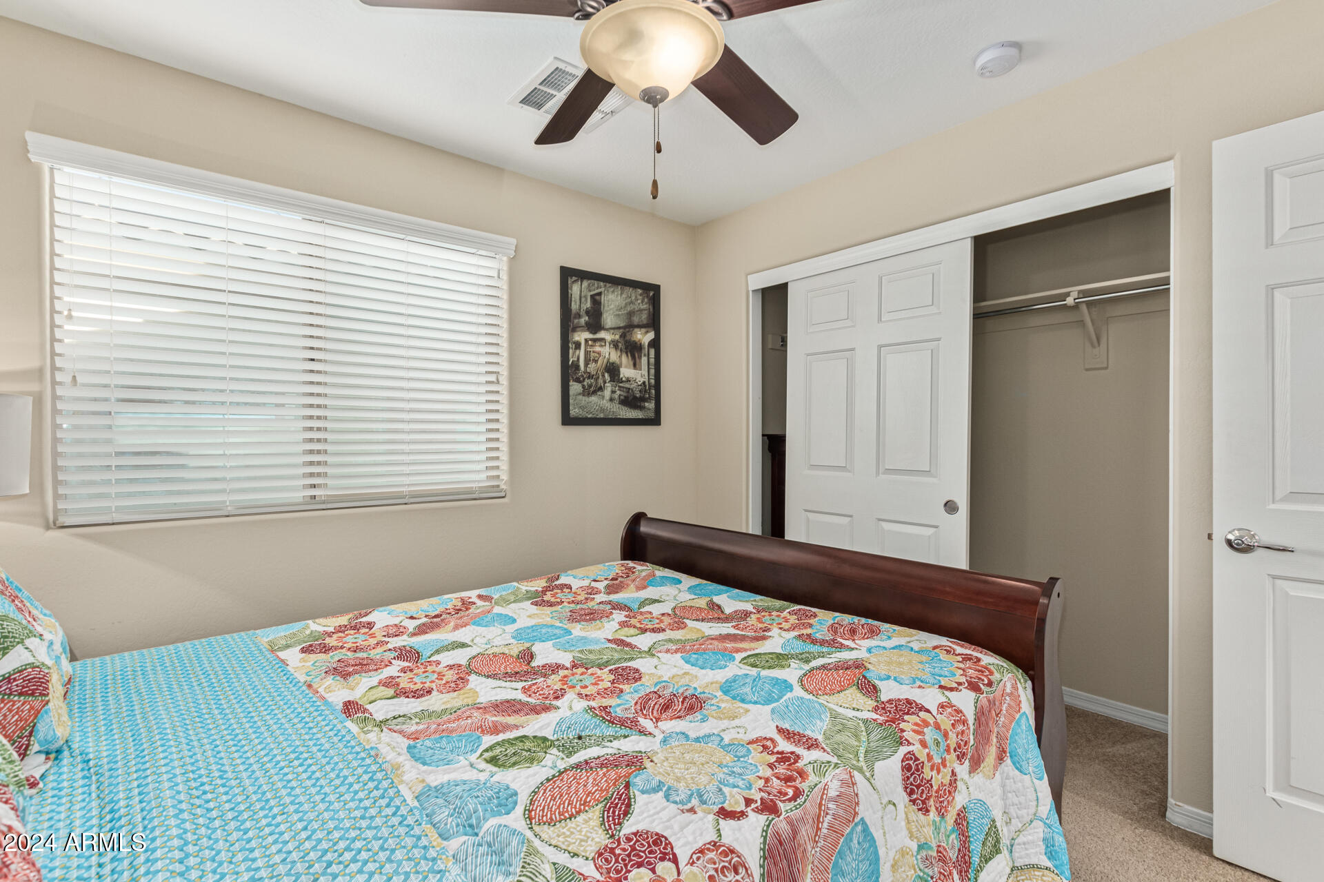 2179 Scully Drive Phoenix, AZ 85023 - Photo 21 of 32 a bedroom with a bed and a window