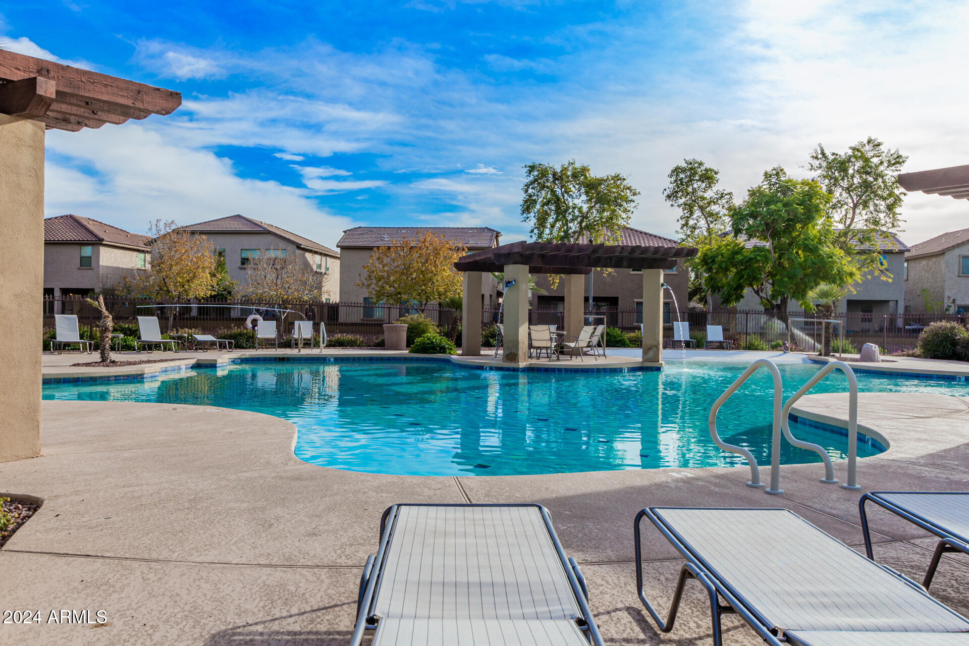 2179 Scully Drive Phoenix, AZ 85023 - Photo 31 of 32 a front view of a house with a yard