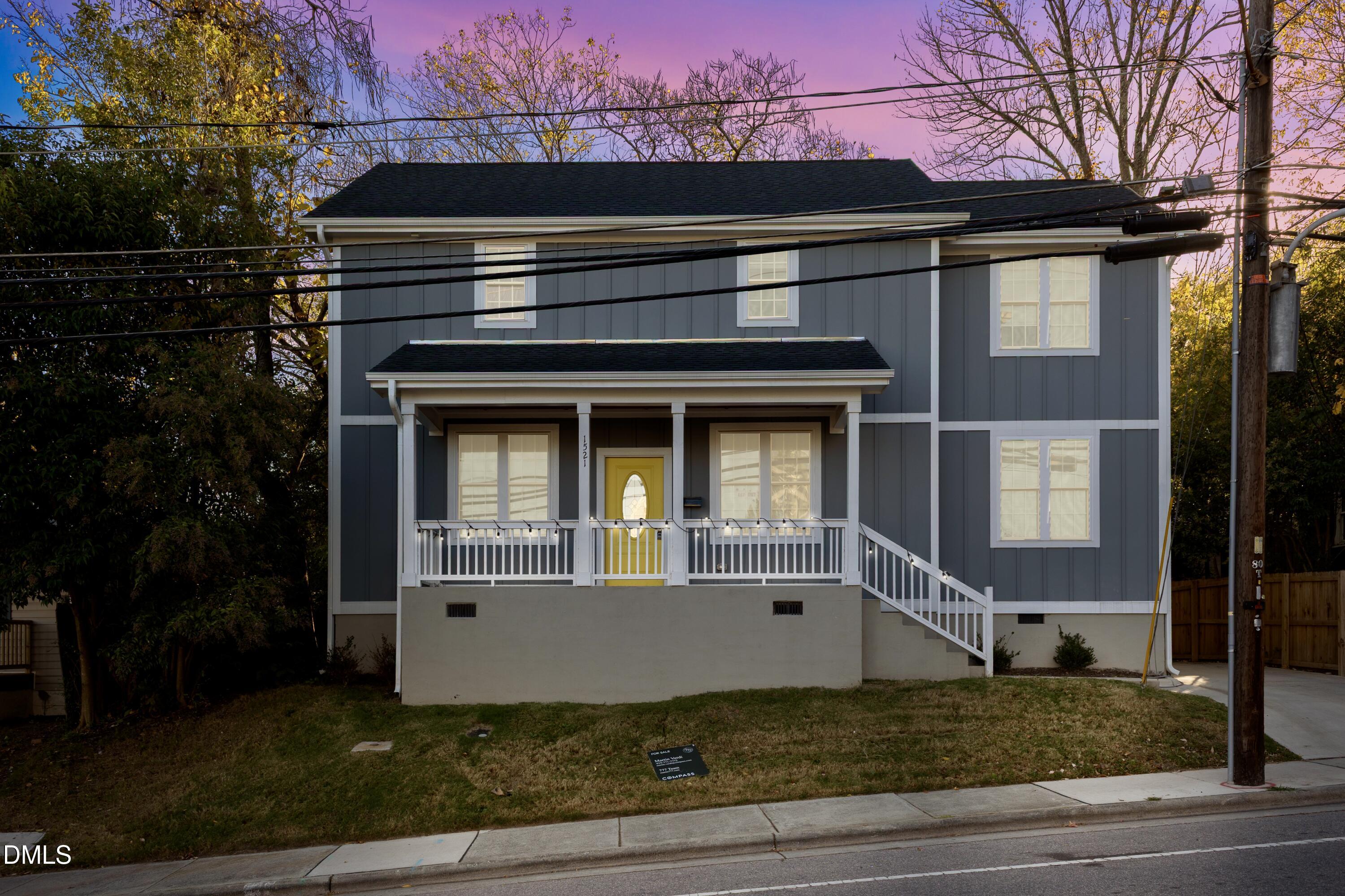 1521 Chapel Hill Road Durham, NC 27701 - Photo 2 of 42 a view of a house with a small yard